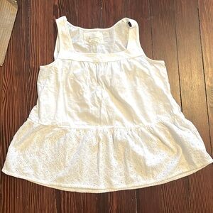 Anthropologie top with eyelet peplum detail. Size medium.